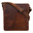 Small brown leather messenger bag in brown front view with shoulder strap