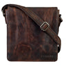 Small vertical brown leather messenger bag with strap front view